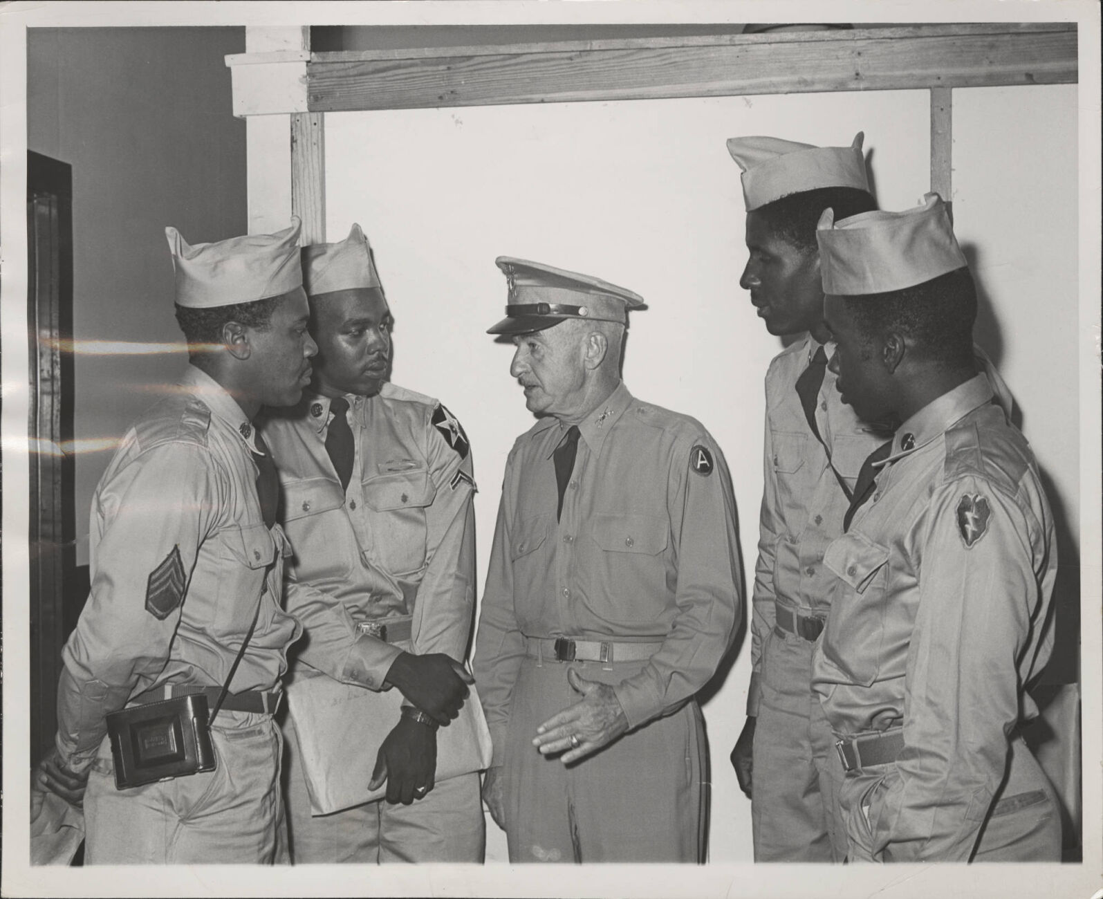 Four soldiers and supervisor at Fort Jackson